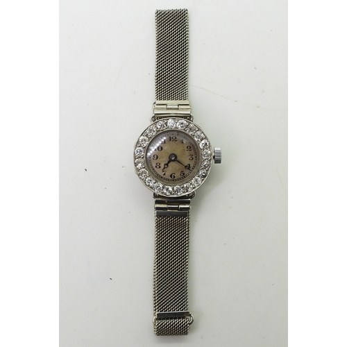 2896 - A VERTEX COCKTAIL WATCHwith a diamond bezel, set with estimated approx 0.70cts of old cut diamonds. ... 