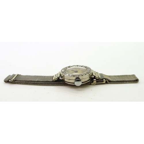 2896 - A VERTEX COCKTAIL WATCHwith a diamond bezel, set with estimated approx 0.70cts of old cut diamonds. ... 