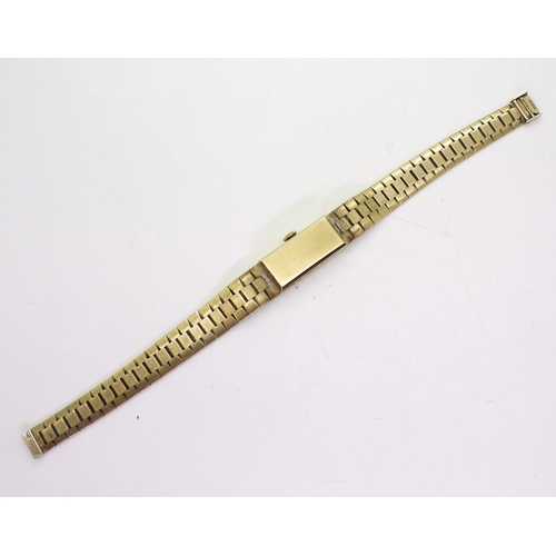 2897 - A 9CT GOLD RETRO WATCHthe dial marked Berkeley Swiss, with black baton, numerals and hands. Hallmark... 