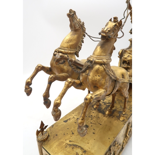 2282 - AN EARLY 19TH CENTURY FRENCH ORMOLU MANTEL CLOCKmodelled as Telemachus standing in a horse driven ch... 