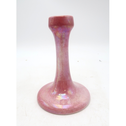 2288 - A PAIR OF 1920'S RUSKIN CANDLESTICKSin pink lustre glaze, impressed marks and date, 17cm high (2)... 