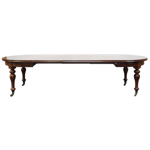 2064 - A LARGE 19TH CENTURY STYLE MAHOGANY WIND OUT EXTENDING DINING TABLE AND FOURTEEN CHAIRStable with D ... 