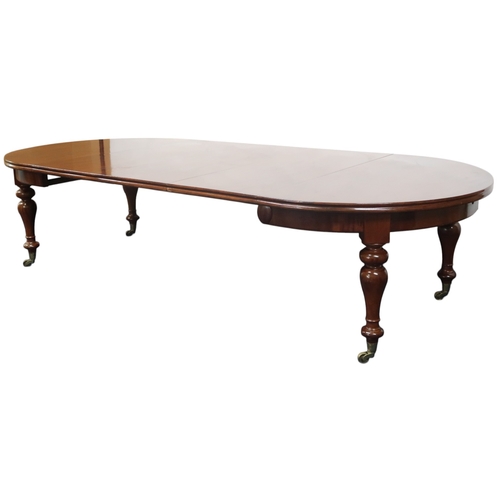 2064 - A LARGE 19TH CENTURY STYLE MAHOGANY WIND OUT EXTENDING DINING TABLE AND FOURTEEN CHAIRStable with D ... 