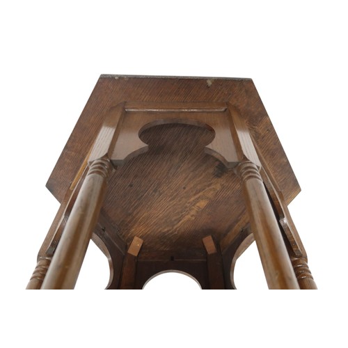 2067 - AN EARLY 20TH CENTURY OAK AFTER LIBERTY & CO HEXAGONAL OCCASIONAL TABLEwith hexagonal top over f... 