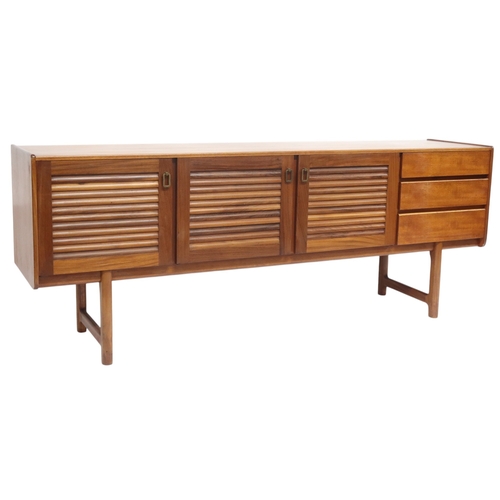 2118 - A MID 20TH CENTURY TEAK A.H. MCINTOSH OF KIRKCALDY LOUVRE DOORED SIDEBOARD with three louvre fr... 