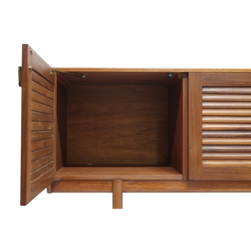 2118 - A MID 20TH CENTURY TEAK A.H. MCINTOSH OF KIRKCALDY LOUVRE DOORED SIDEBOARD with three louvre fr... 