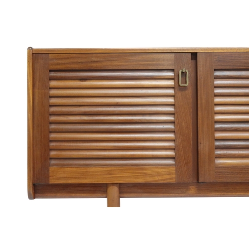 2118 - A MID 20TH CENTURY TEAK A.H. MCINTOSH OF KIRKCALDY LOUVRE DOORED SIDEBOARD with three louvre fr... 