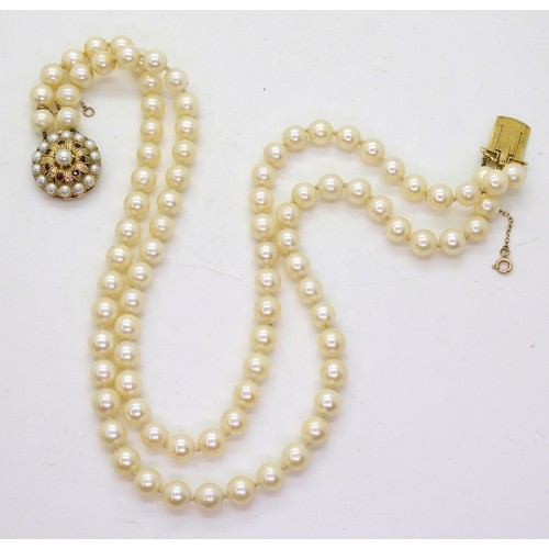 2727 - PEARLS WITH A FANCY CLASPthe pearls are approx 7.5mm, shortest length 39cm. The round flower shaped ... 