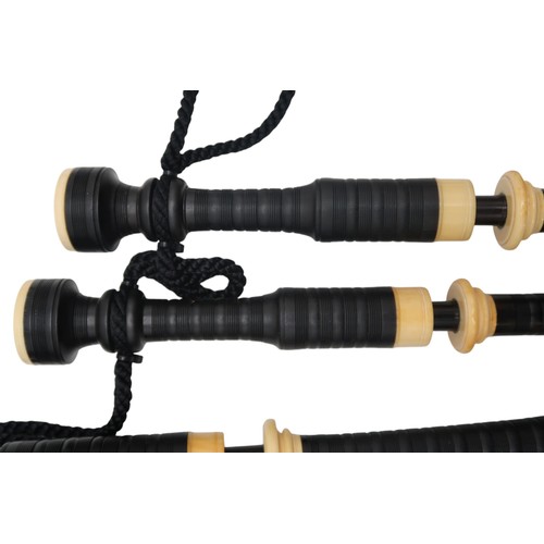 2642F - MACDOUGALL HIGHLAND BAGPIPESA set of full Scottish Highland bagpipes, ebonised with ivory mounts and... 