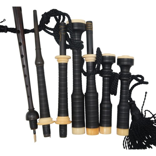 2642F - MACDOUGALL HIGHLAND BAGPIPESA set of full Scottish Highland bagpipes, ebonised with ivory mounts and... 