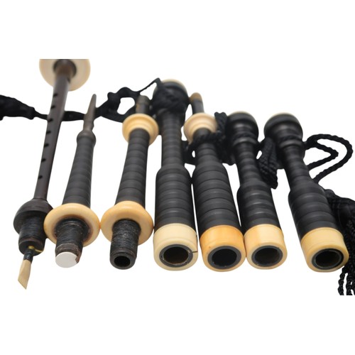 2642F - MACDOUGALL HIGHLAND BAGPIPESA set of full Scottish Highland bagpipes, ebonised with ivory mounts and... 