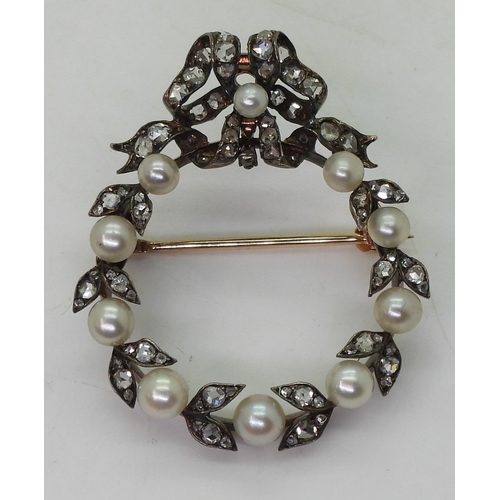 2820 - A 14K PEARL AND DIAMOND BROOCHwhich can also be worn as a pendant, set with whole graduated pearls, ... 