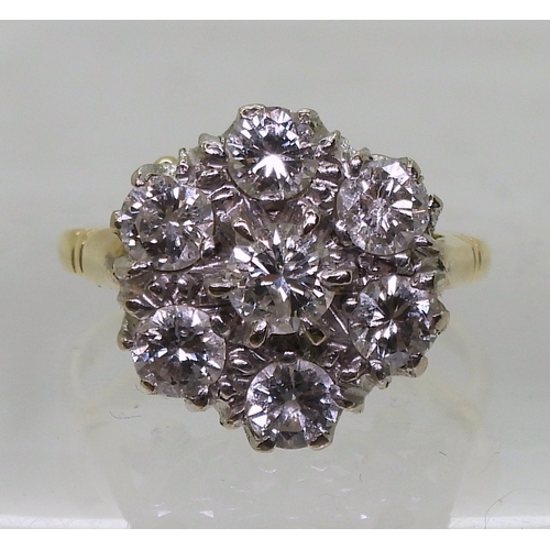 2821 - A DIAMOND FLOWER RINGmounted in 18ct yellow and white gold, set with estimated approx 1.50cts of bri... 