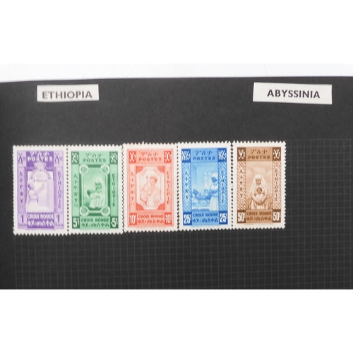 483 - A worldwide stamp collection in a stock book and albums