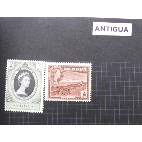 483 - A worldwide stamp collection in a stock book and albums