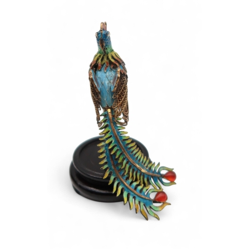 252 - A Chinese cloisonne enamel model of a phoenix, on base with case, 9cm high