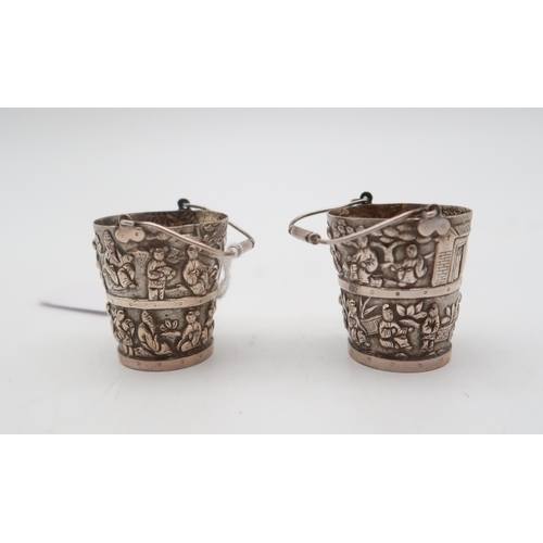 259 - A pair of Chinese export silver salts, modelled as buckets, with figural decoration, marked to bases... 