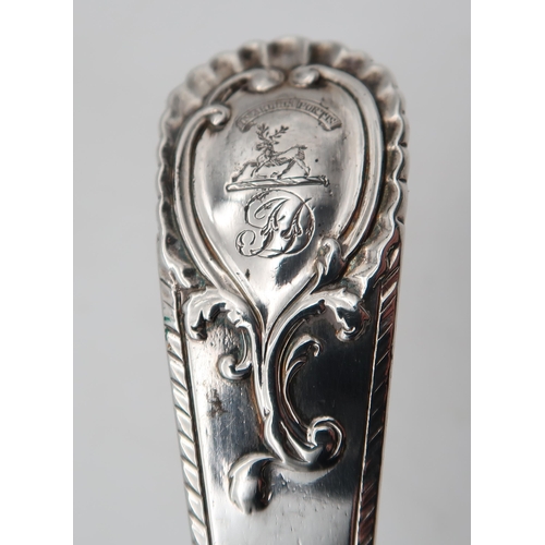 268C - A George III silver soup ladle, by London 1775, in the feathered edge Old English pattern, with a sh... 