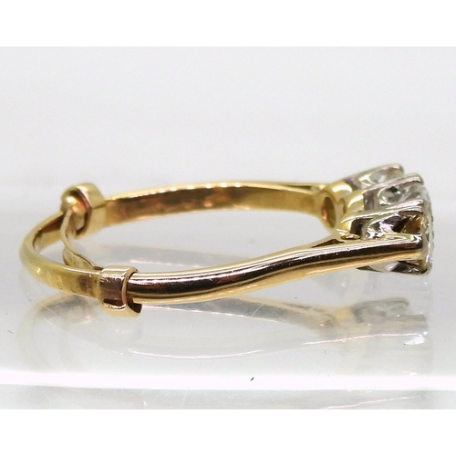 774 - A three stone diamond ring, made in bright yellow metal set with estimated approx 1ct in total of br... 