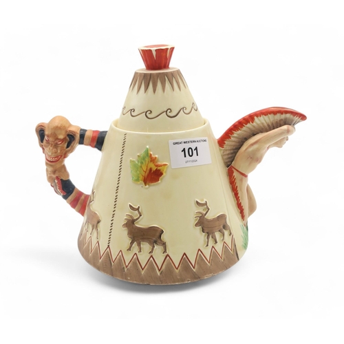 101 - A Clarice Cliff Greetings from Canada novelty teapot, the body modelled as a teepee, with figural sp... 