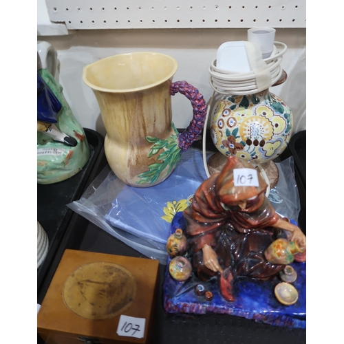 107 - A group of decorative ceramics including a Charlotte Rhead jug, a Clarice Cliff My Garden jug, two c... 