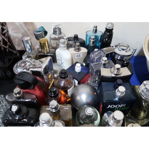 112 - A collection of mainly men's aftershave, mostly testers including Lacoste, Jimmy Choo, Joop!, Calvin... 