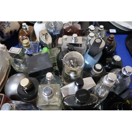 114 - A collection of mainly men's aftershave, mostly testers including Hugo Boss, Calvin Klein, Paco Raba... 