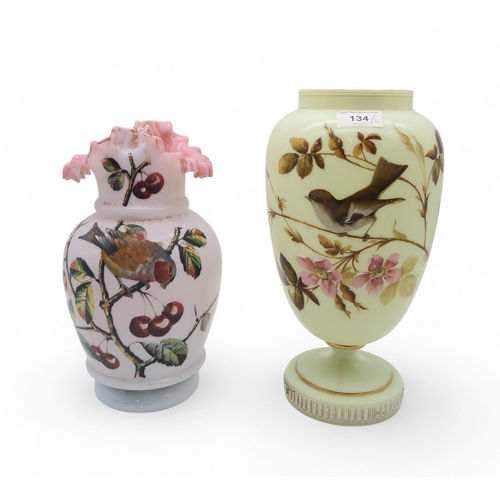 134 - Two Victorian glass vases, both painted in enamels with birds, one in a cherry tree, the other on a ... 