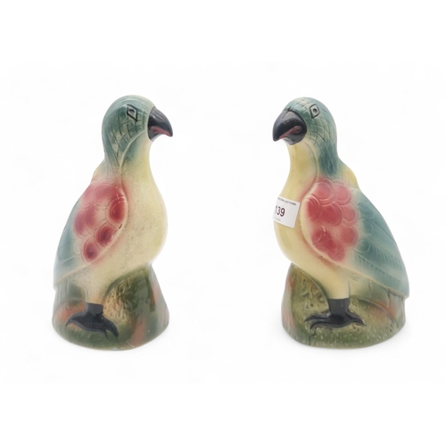 139 - A pair of Britannia Scottish pottery parrots