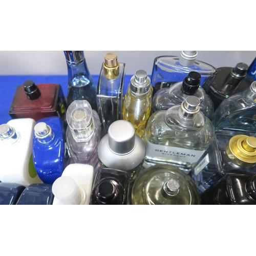 147 - A collection of mainly men's aftershave, mostly testers including Hugo Boss, Mont Blanc, Givenchy, D... 