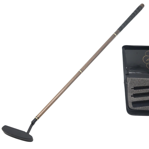 402 - A Dunhill sectional wooden-shafted putter, commemorating the Alfred Dunhill Cup, housed in a fitted ... 