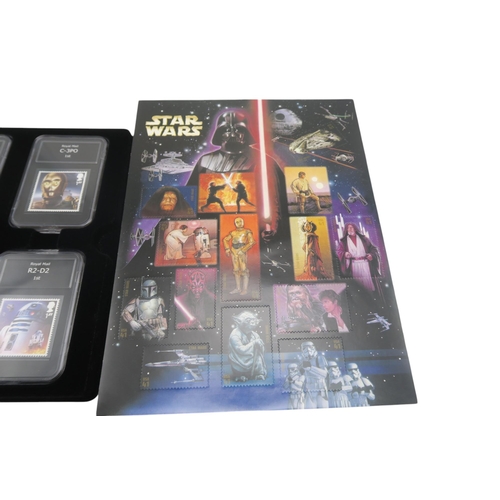 498A - A Star Wars Premium Capsule Edition Stamp Collection, with COA no. 0760, a Star Wars presentation pa... 