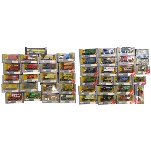 526 - A large collection of boxed Corgi Classics 1:43-scale die-cast model vehicles, largely vintage adver... 