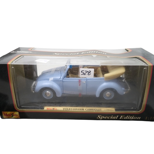 528 - A Minichamps 1:18-scale Jaguar Racing R5 M. Webber F1 car, two A Model Lotus 49B U.S.A. G.P. 68 Mari... 