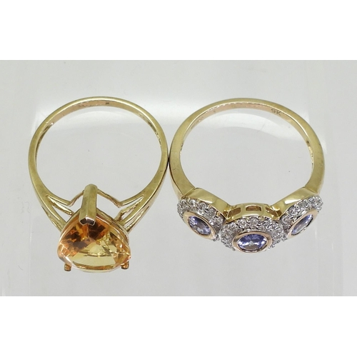 708 - A 9ct gold pear shaped citrine ring, size P1/2, and a 9ct gold blue and clear gem set cluster ring, ... 