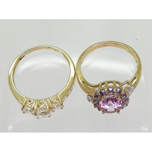 710 - A 9ct gold pink and purple gem ring with diamond accents, size R, weight 4.1gms, and a 14k gold clea... 