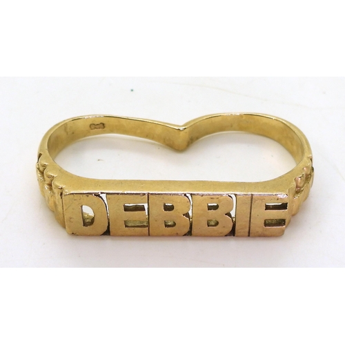 718 - A 9ct gold 'Debbie' double finger ring, weight 12.2gms