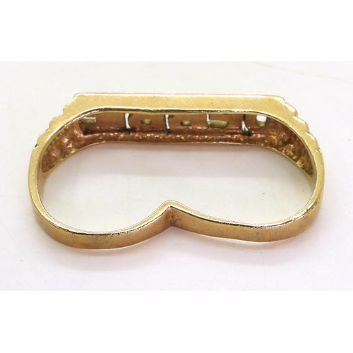 718 - A 9ct gold 'Debbie' double finger ring, weight 12.2gms