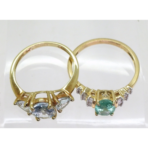 722 - A 9ct gold emerald and baguette cut diamond ring, size R1/2, together with an aquamarine three stone... 