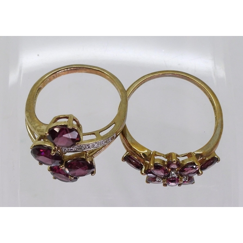 756 - Two 9ct gold and diamond accent rings, flower size Q1/2, four garnet cluster size N, weight together... 