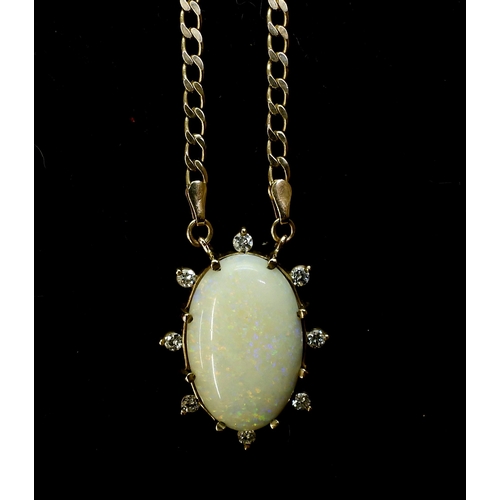 769 - A 9ct gold large white opal and diamond pendant, set with estimated approx 0.40cts of brilliant cut ... 