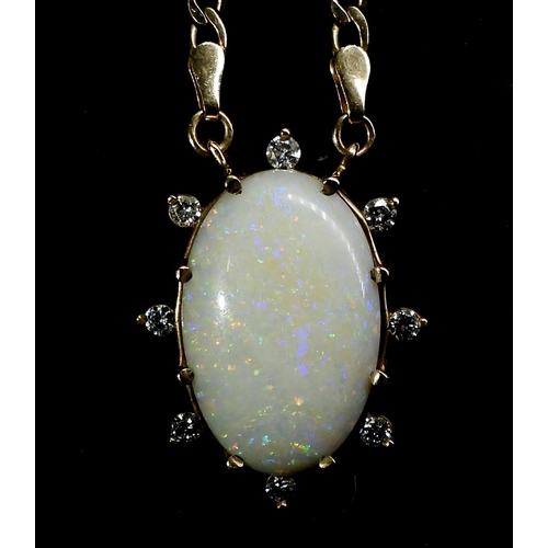 769 - A 9ct gold large white opal and diamond pendant, set with estimated approx 0.40cts of brilliant cut ... 