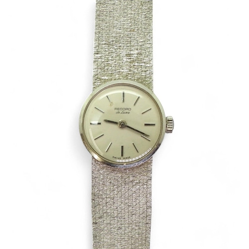 794 - A 9ct white gold ladies Record De Luxe, with integral woven strap, weight including mechanism 32.2gm... 