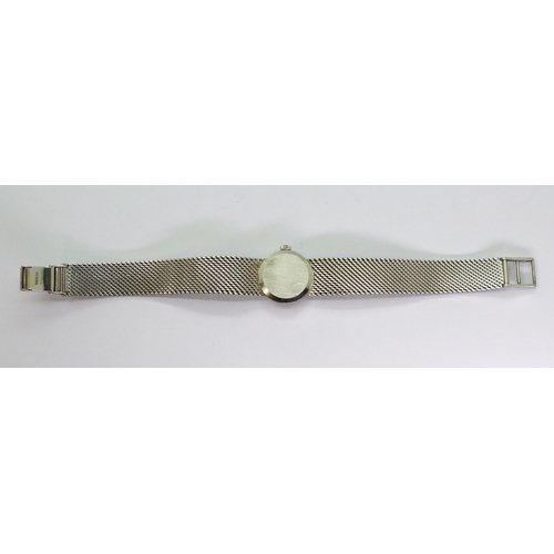 794 - A 9ct white gold ladies Record De Luxe, with integral woven strap, weight including mechanism 32.2gm... 