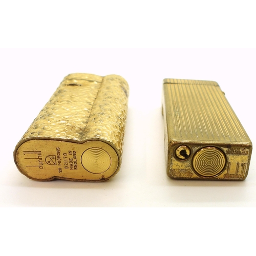 850 - Two gold plated vintage Dunhill lighters, together with a collection of silver and white metal chain... 