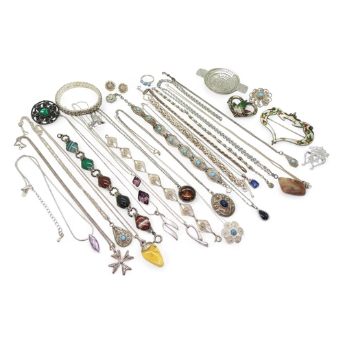 853 - Collection of silver and white metal jewellery, including an enamelled Canadian souvenir brooch and ... 