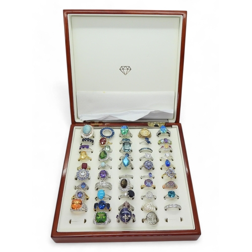 855 - Collection of silver gem-set rings, including opal, aquamarine, peridot, mystique topaz, amethyst, a... 