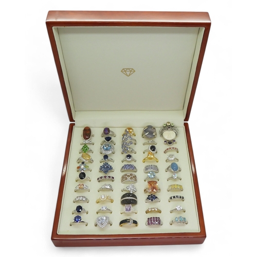 857 - Collection of silver gem-set rings, including star sapphire (af), opal, mermaid topaz, a well-carved... 