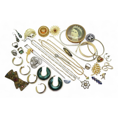 863 - A gold-plated bangle, together with a silver-mounted three pence ring, various vintage brooches, inc... 