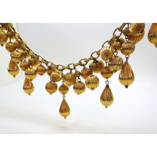 876 - A 1980s gold-plated statement necklace by Gerard Yosca,  length of chain approx. 104cmBeing sold to ... 